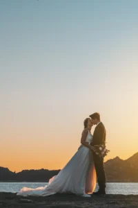 Just married couple against the sky